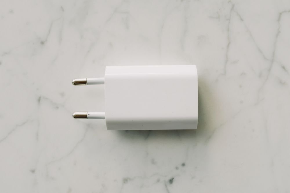 White wall adapter on marble