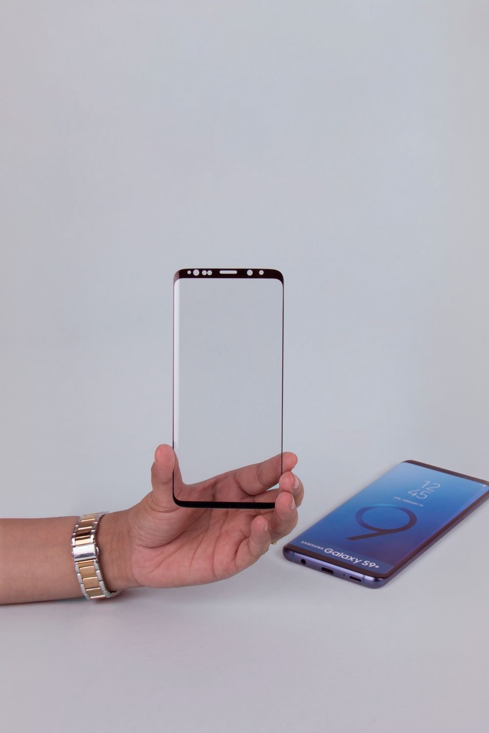 Hand holding a screen protector